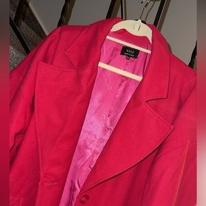 Vici. Long pink coat.